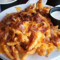 Bacon Cheese Fries · A large order of fries topped with cheddar cheese sauce and bacon bits. Served with ranch dr...