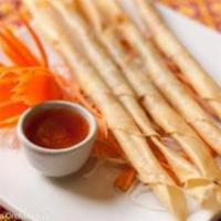 Lady Finger Rolls · Vegetarian deep fried long thin rolls. Marinated in a black pepper and light soy sauce, mixe...