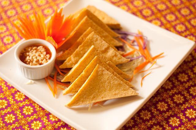 Crispy Tofu · 8 pieces. Vegetarian deep fried bean cakes served with sweet chili sauce  topped ground peanuts. Vegetarian.