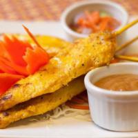 Chicken Satay · 4 pieces. Chicken marinated overnight with Thai herbs, satay powder and coconut milk then gr...