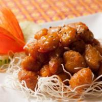 Orange Chicken · Deep fried chicken mixed in tapioca flour and marinated in sweet and sour sauce.