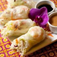 Fresh Rolls · 2 pieces. Steamed shrimp and chicken, lettuce and vegetables wrapped in rice paper skin. Ser...