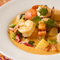 Pineapple Curry · Panang curry in coconut milk with prawns, pineapple, zucchini, bell pepeprs, green peas, kaf...