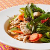 Pad Gra Prow · Sauteed with meat, bell peppers, onions, carrots, bamboo shoot, green beans and Thai basil. ...