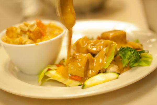 Pra Ram · Mixed steamed veggies and stir-fried meat. Topped with peanut sauce and ground peanuts. Includes steamed jasmine rice.