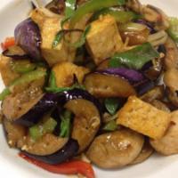 Eggplant Tofu · Sauteed tofu with onions, bell peppers, mushrooms, eggplants and Thai basil with special sau...