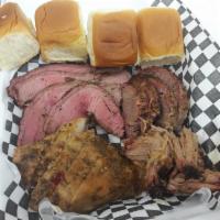 4. 4 Meats and 4 Small Sides Plate · Your choice of any 4 of our 5 smoked meats, along with your choice of 4 small sides. Served ...