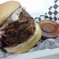 Beef Brisket Sandwich with 1 Small Side · Slow-smoked beef brisket, piled high on a fresh, lightly toasted bun. Served with cole-slaw ...