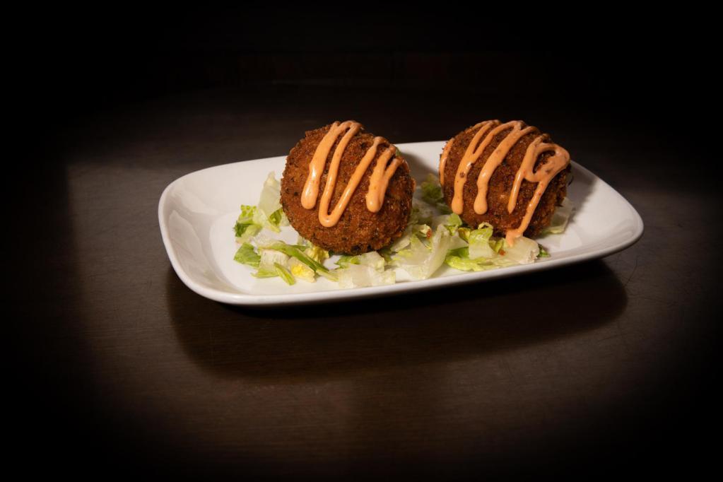 Fried Mac and Cheese Balls · Deep Fried mac, brisket and bell peppers. Served with chipotle mayo.