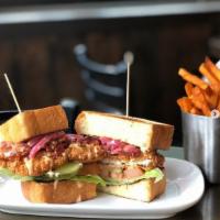 Country Fried Chicken Sandwich · Fried chicken, lettuce, tomato, pickled red onions, bacon, chipotle mayo on Texas toast.
