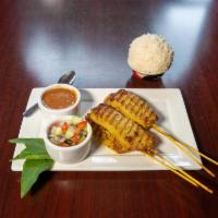 2. Kai Satay · 4 skewers grilled chicken breast marinated with coconut milk and curry spice, served with ho...