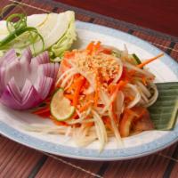 17. Papaya Salad (Som Tum) Vegetarian Salad · Fresh papaya, carrot, cherry tomato, ground peanut and fresh green bean chili lime dressing.