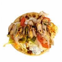 Chicken Souvlaki Pita Wrap · Specially marinated, skewered and flame-broiled chicken breast, chopped and wrapped in a who...