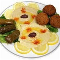 Combo Appetizer · Hummus, baba ghanouj, dolmas and falafel.
