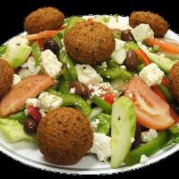 Falafel Salad · Served with pita bread and house dressing.