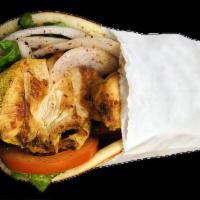 5. Chicken Souvlaki Pita · Marinated pieces of chicken breast flamed to perfection with lettuce, onions, tomatoes and o...