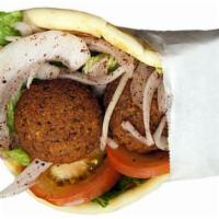 8. Falafel Pita · Deep-fried patties of ground chickpeas mixed with herbs and spices with onion, tomato, lettu...