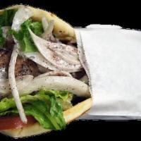 11. Kefta Kebab Pita · Seasoned ground beef & lamb charbroiled on a skewer and served with tomato, onion, lettuce a...