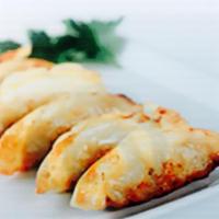 Pot Sticker · 6 pieces. Dumpling stuffed with choice of veggie and chicken or veggie and pork. Served with...