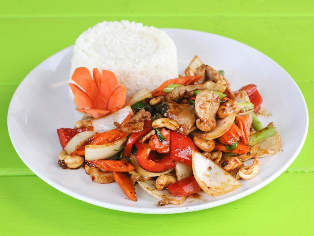 Pad Cashew · Choice of meat stir fried with chili paste, bell peppers, carrot, cashew nuts, onions and green onions. Served with jasmine white rice.