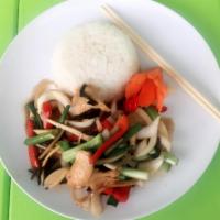 Pad Ginger · Stir fried fresh ginger, garlic, bell peppers, mushrooms, onions and green onions. Served wi...