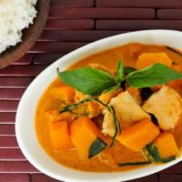 Pumpkin Curry · Red curry with coconut milk, pumpkin, bell pepper and basil leaves.