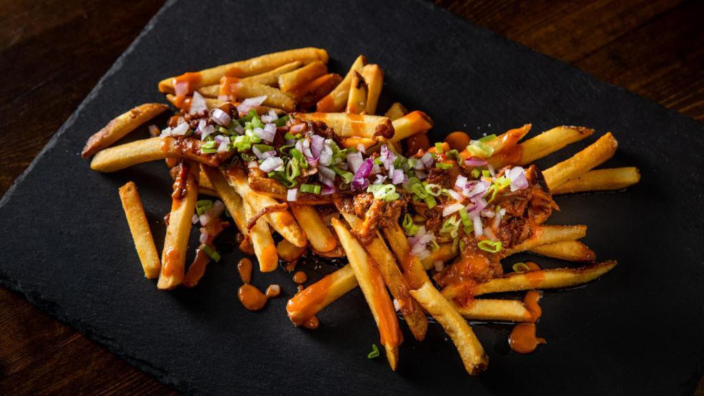 Dirty Fries · French fries topped with Burnt Ends, spicy wing sauce, scallions and red onion. Spicy.