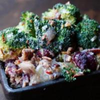 Broccoli Salad · Bacon, toasted almonds, red onion, dried cranberries tossed in house-made creamy dressing.