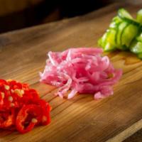 Pickled Vegetables · House made pickled veggies. Your choice of pickled cucumber, pickled onion, or pickled chiles.