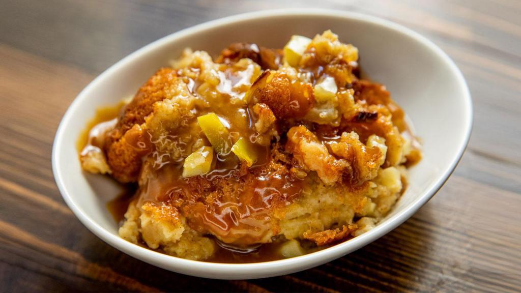 Cinnamon Bun Bread Pudding · with butterscotch and apple cider glaze