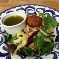 The Roma Salad · Baby greens, red beets, apple, shaved fennel, walnuts and a goat cheese medallion tossed in ...