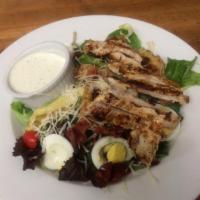 Campagna Salad · Baby greens, tomato, egg, bacon, chicken breast and artichoke fritti served with herbed butt...