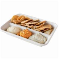 Spread Trio with Pita Chips · Pita Chips served with Hummus, Baba Ganoush, Fire Feta