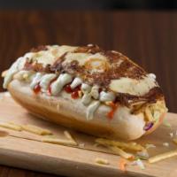 Salchiqueso Dog · Beef hot dog in a warm bun with coleslaw, potato stix, mayo, ketchup, kourmet sauce and whit...