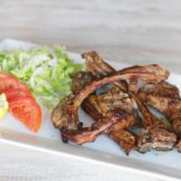 Lamb Chops · Grilled lamb chops. With mash potato and spinach