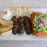 Qofte Platter · Beef and lamb with lettuce, onions and tzatziki with pita bread.