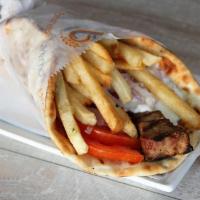 Pork Kebab Sandwich · Tomato, onions, french fries and tzatziki on pita.