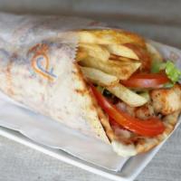 Chicken Kebab Sandwich · Lettuce, tomato, french fries and homemade sauce on pita.