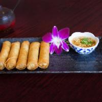 4 Pieces Thai Crispy Rolls · Crispy filled with pork, crystal noodles, carrots and onions. Served with a delicious sweet ...