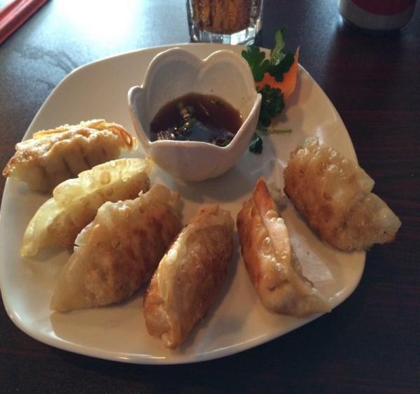 6 Pieces Pot Stickers · Steamed and pan seared pork dumplings served with a ginger sweet and soy sauce.