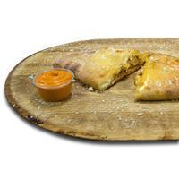 Buffalo Chicken Calzone · Buffalo Chicken Calzone: Oven Roasted Chicken Breast, Our Homemade Buffalo Sauce, Fresh Mozz...