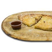 BBQ Pulled Pork Calzone · BBQ pulled pork calzone: slow-cooked pork shoulder in our pizzeria every day! Fresh dough, o...