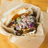Berlin Döner Combo · Berliner red sauce, feta, cabbage, carrot slaw and sumac tomato, onion, cucumber and tzatzik...