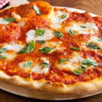 Margarita Pizza · Fresh tomatoes, mozzarella, olive oil and garlic.