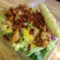 Chicken Coop Salad · 3-leaf blend, Cheddar Jack, bacon, grilled chicken, red onions and ranch dressing.