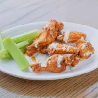 Buffalo Dry Rub Wings · Our proprietary blend of spices with all the flavors of Buffalo sauce without the mess.
