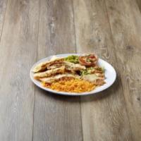Quesadilla Regular · Flour tortilla with cheese, steak or chicken, salad, rice and beans.