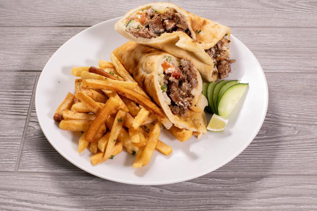 Gyro Sandwich · Served with rice and salad.