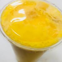Mango Lassi · Mango lassi is made with mango pulp , yogurt, sugar