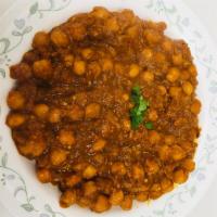 Chana Masala (vegan) · It’s Garbanzo beans curry,  cooked with onion garlic ginger tomato pasta, all Indian spices
